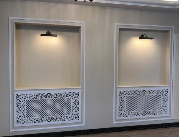 Декоративные экраны на радиаторы отопления в отеле